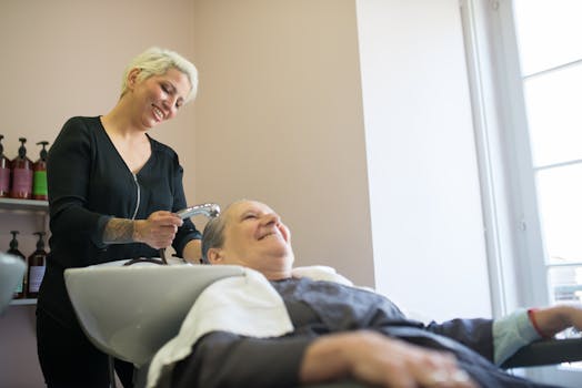 happy client receiving hair treatment