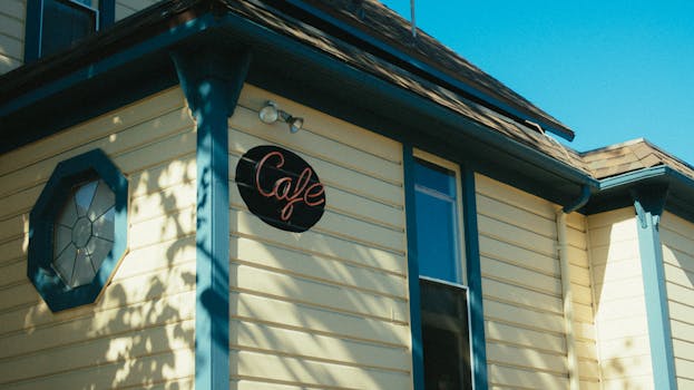 salon exterior with welcoming sign