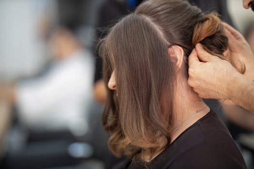 A stylist happily engaging with a client