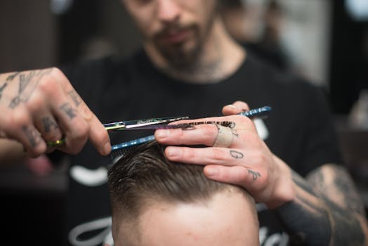 A stylist working on a client’s hair