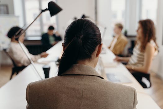 salon staff managing schedules on a computer