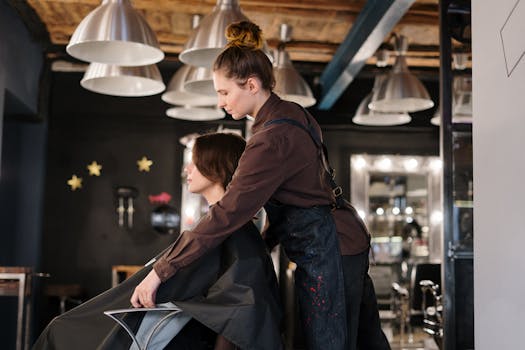 stylist working on a client with bright, colorful hair